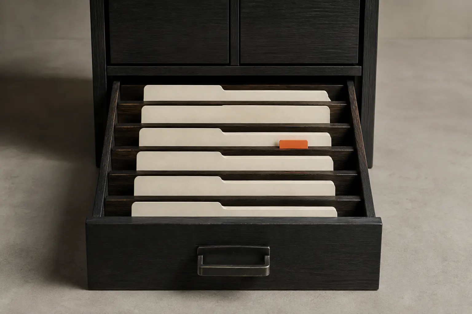Six ordered cream index cards in a blackened-oak archival drawer